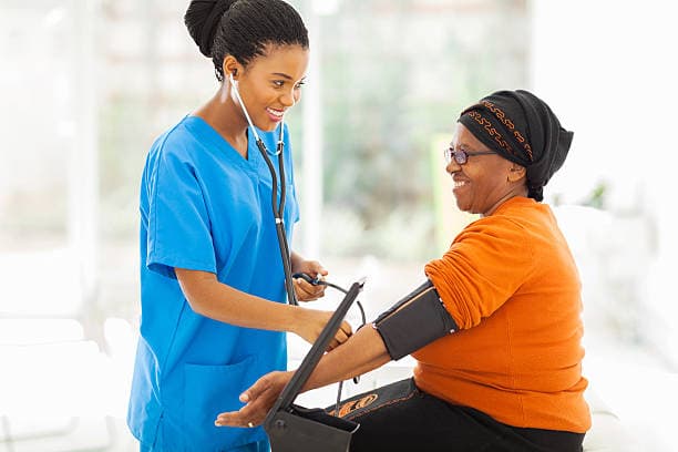 Person checking blood pressure at home